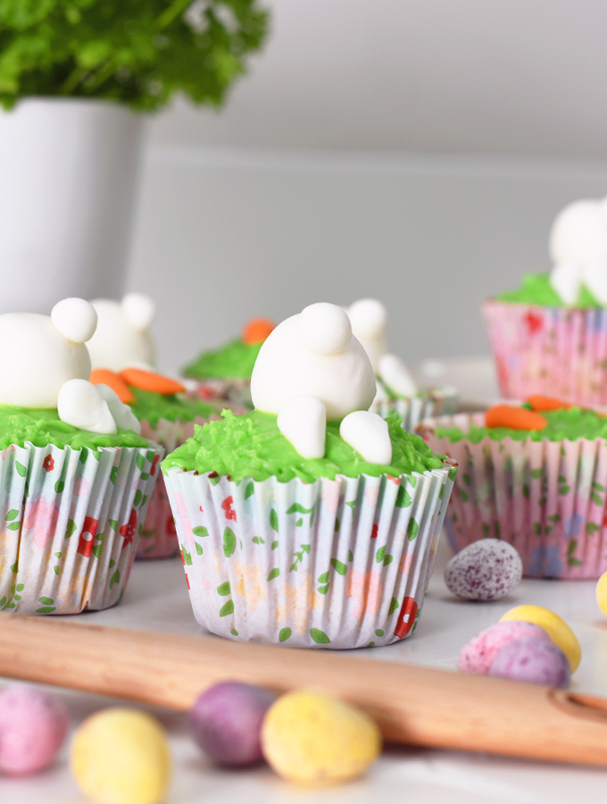 Simple bakes recipe four, Bunny Cupcakes with green icing alongside ProCook silicone spatula