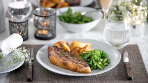 Steak dinner plated on ProCook tableware for a romantic meal for two