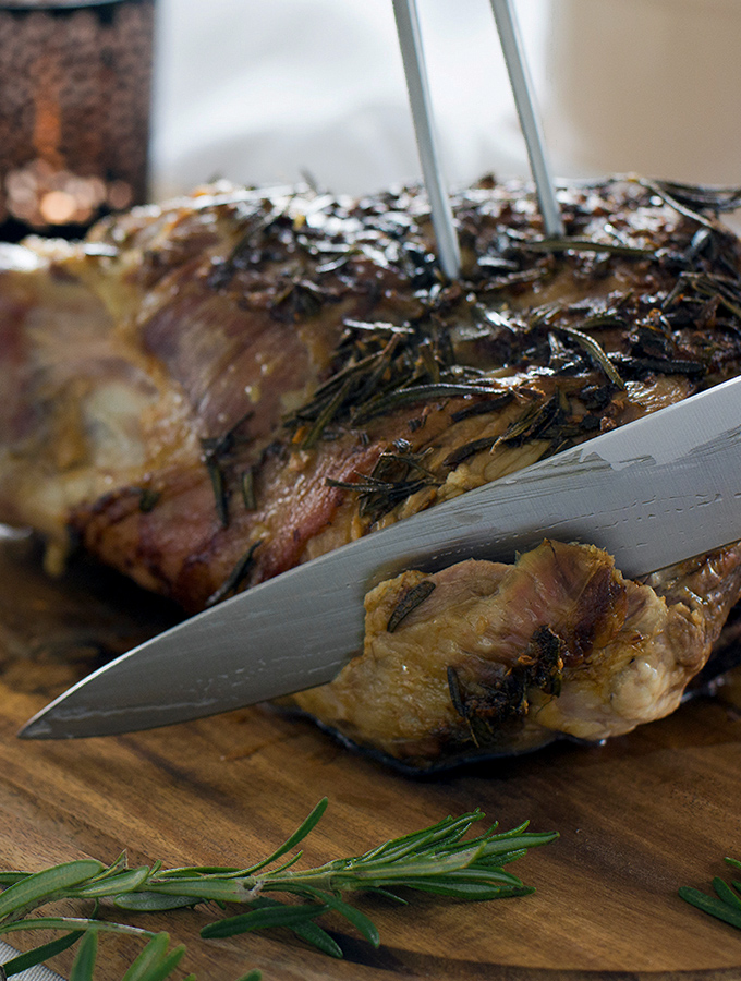 Carving roast leg of lamb with ProCook carving knife