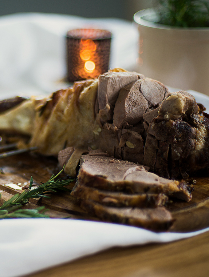 Roast leg of lamb served on ProCook carving board