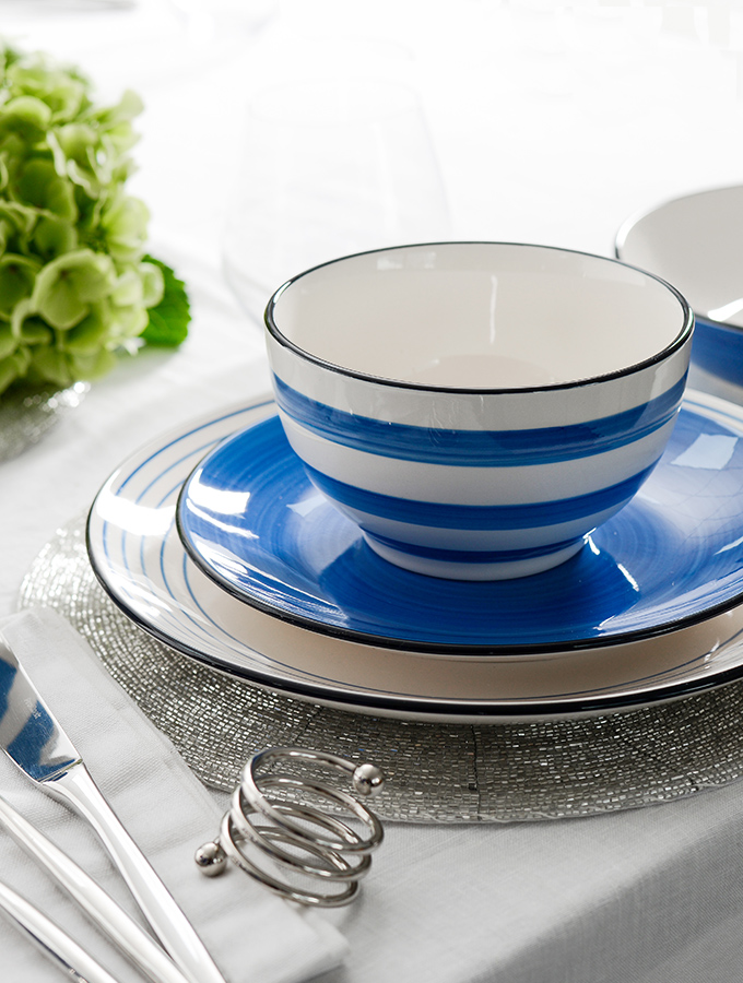 ProCook Coastal blue tableware stack at the table