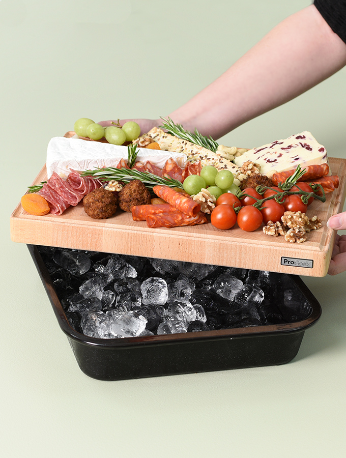 Keep your sharing board cool by placing a ProCook Chopping Board over a Roasting Tray filled with ice